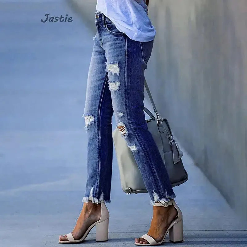 Distressed Stretch Denim Jeans