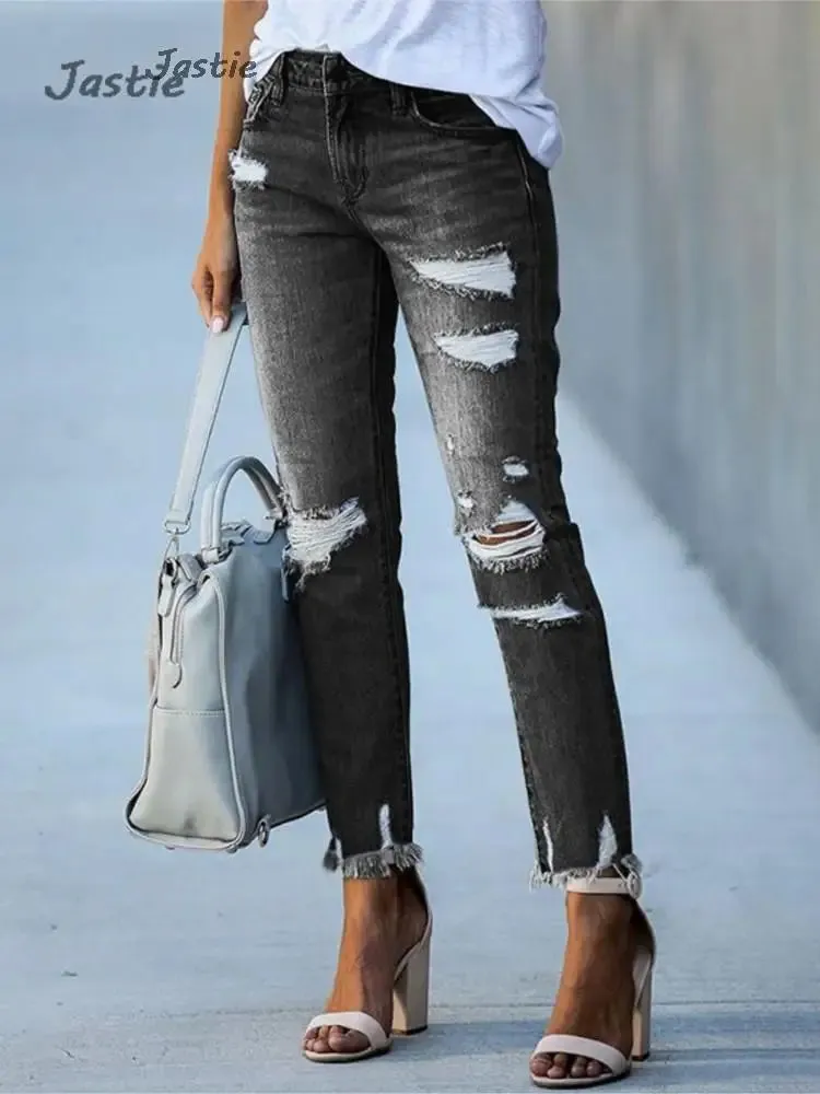 Distressed Stretch Denim Jeans