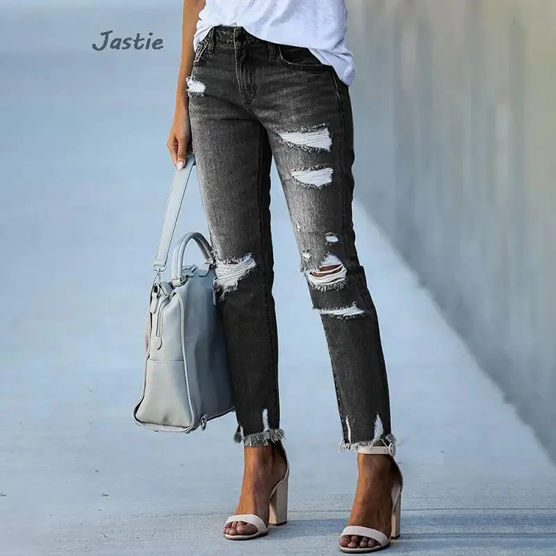 Distressed Stretch Denim Jeans