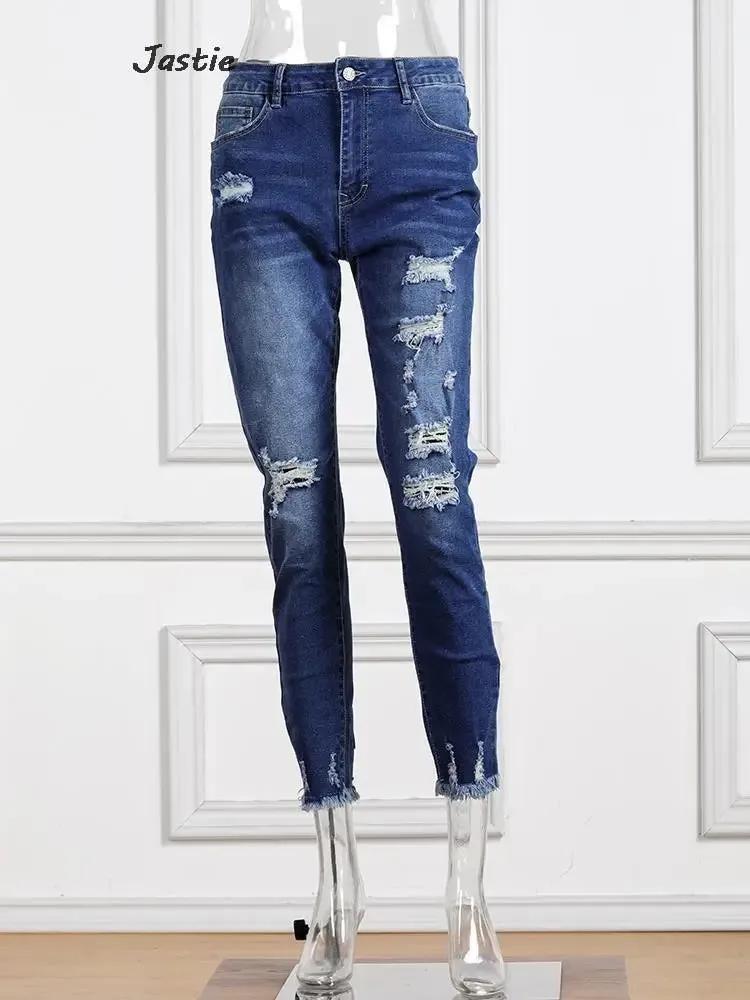Distressed Stretch Denim Jeans