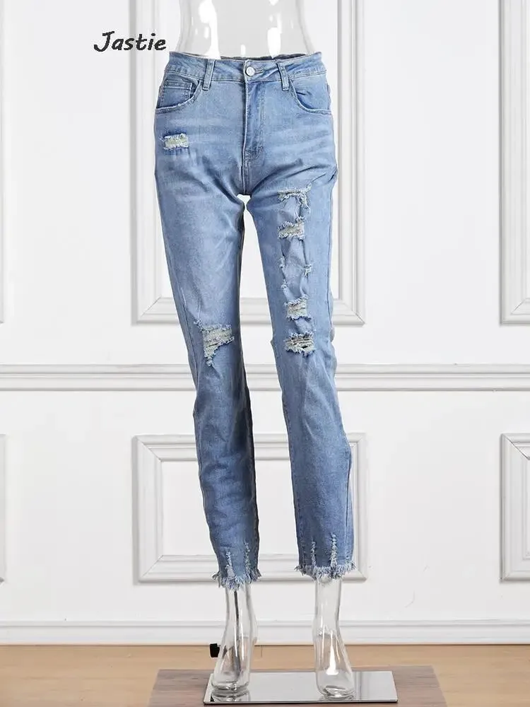 Distressed Stretch Denim Jeans
