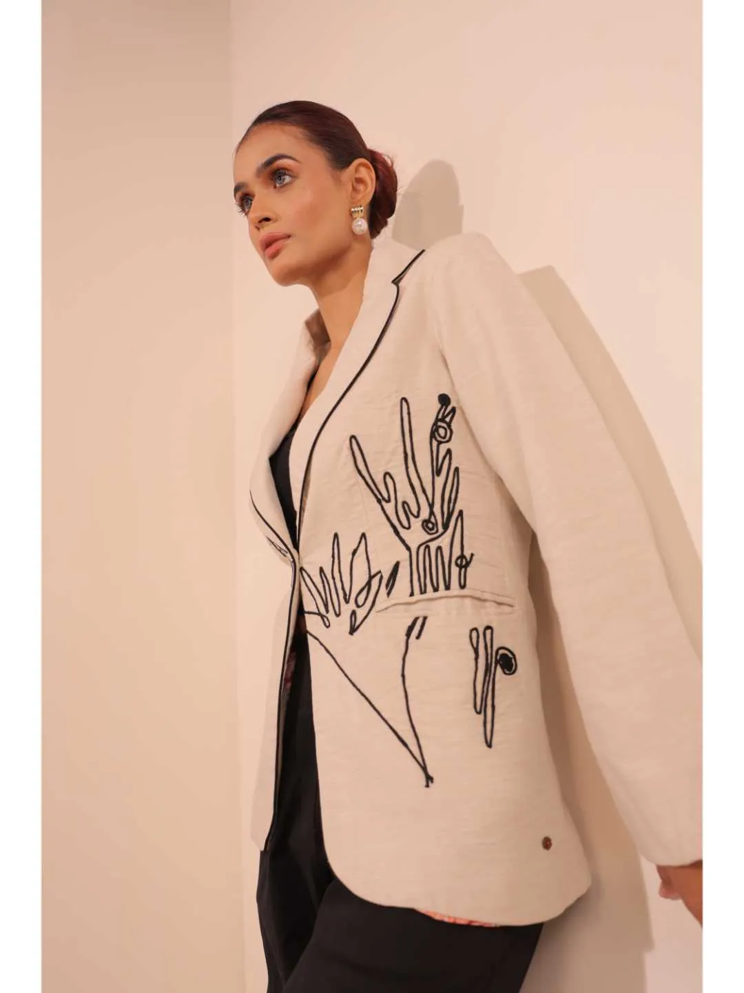 graceful pure cotton modernise embroiderd lapel full sleeve semi-formal jacket with handy pockets.- Beige